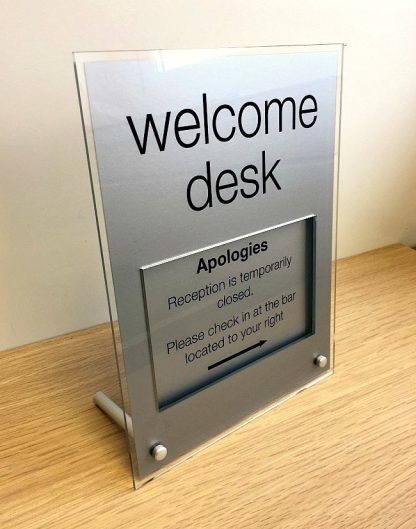 silver desk sign