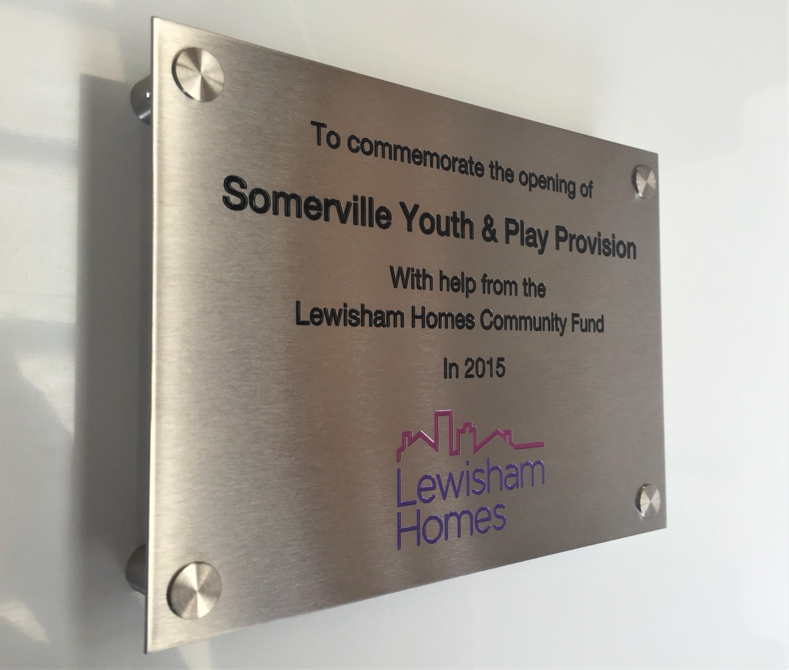 engravedbrushedsteelopeningplaque BuySigns