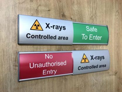 X-ray controlled area slider sign