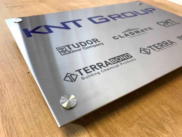 knt-group-exterior-grade-stainless-steel-sign-engraved-with-group-of-companies-with-colour-logo-01