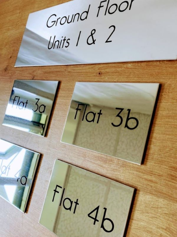 mirror-finish-stainless-steel-etched-flat-number-signs