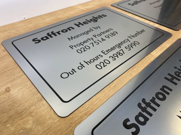 property-managed-by-stainless-steel-engraved-etched-signs