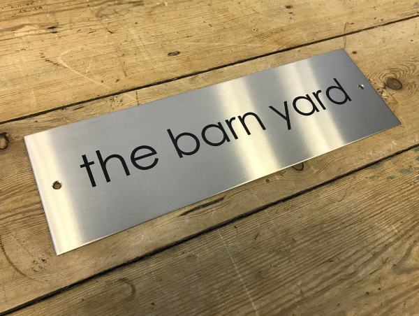the barn yard steel sign