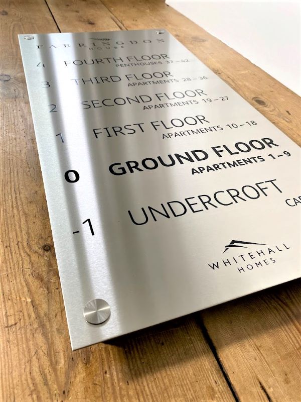 whitehall-homes-floor-level-directory-steel-sign-with-black-lettering-and-standoff-fixings