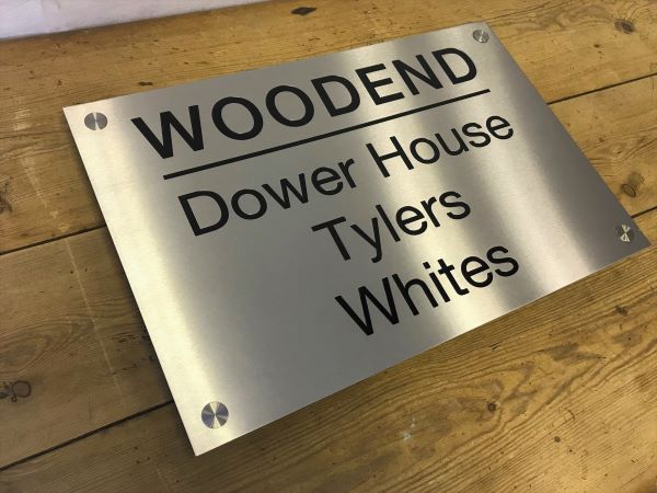 woodend-marine-grade-brushed-stainless-steel-etched-sign-with-black-lettering